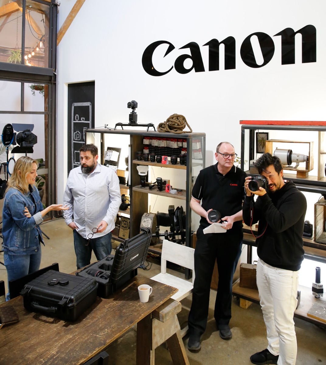 Camera technician at SUNSTUDIOS reviews the Canon EOS R
