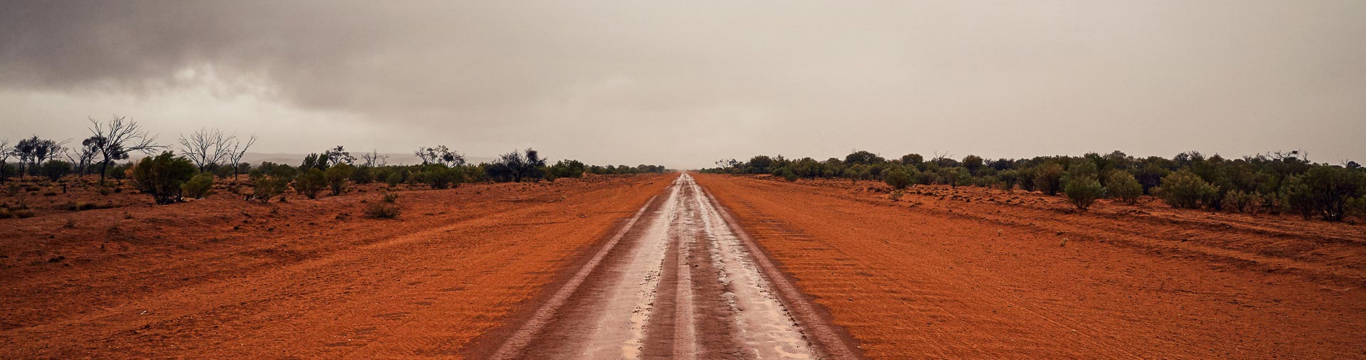 Image by Sean Izzard of a dirt road on an overcast day, exhibited as a part of This Time Its Personal at SUNSTUDIOS 2019