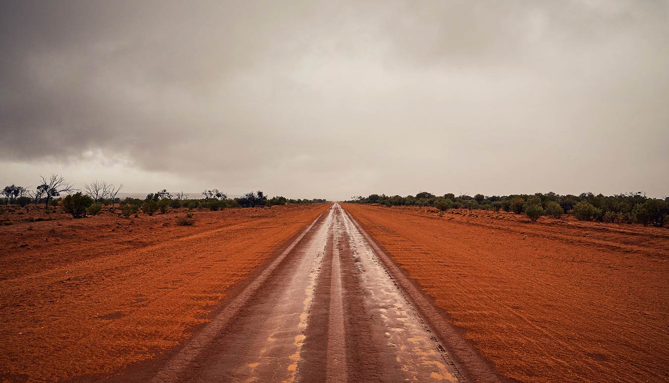 Image by Sean Izzard of a dirt road on an overcast day, exhibited as a part of This Time Its Personal at SUNSTUDIOS 2019