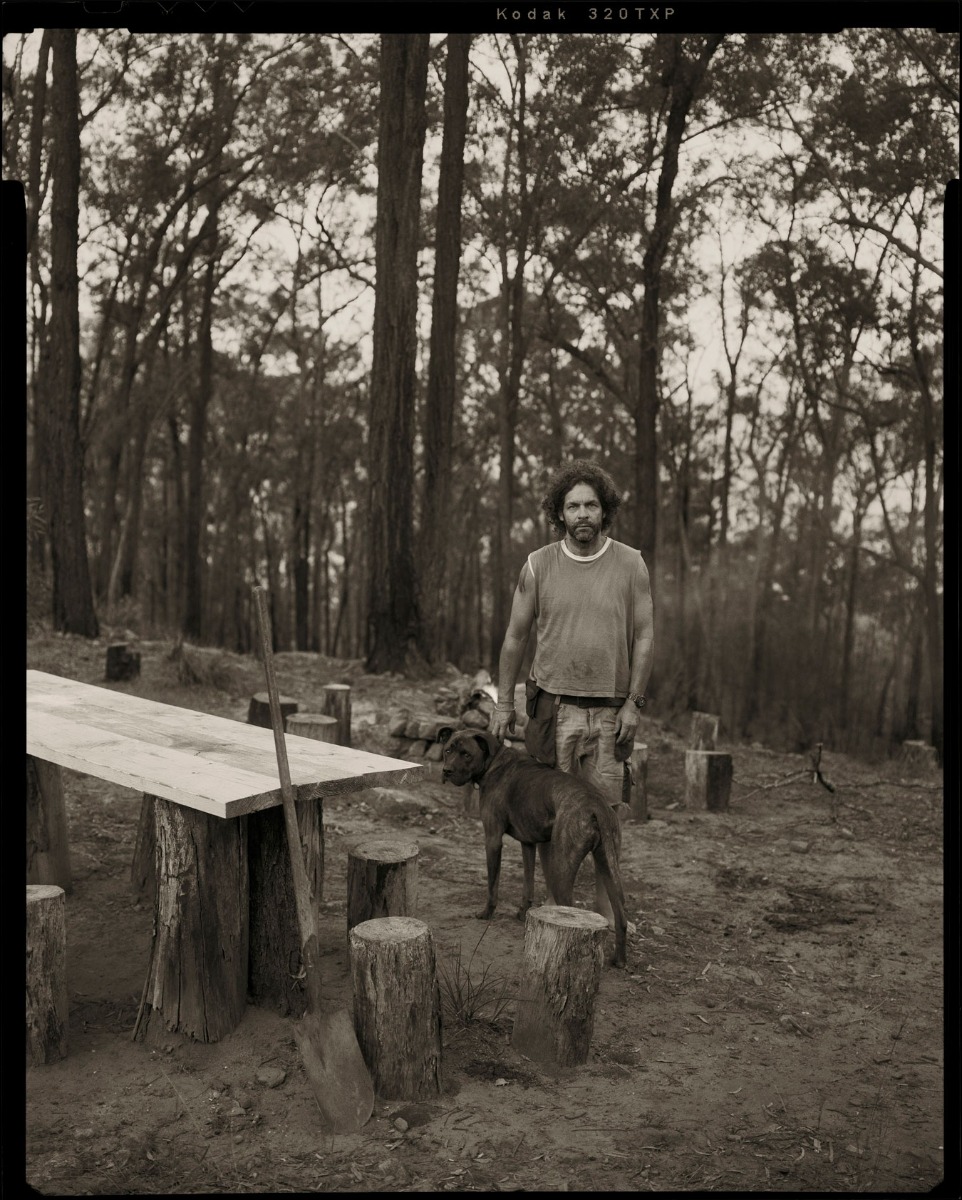 photographer-ingvar-kenne-on-his-bushland-property-with-his-dog