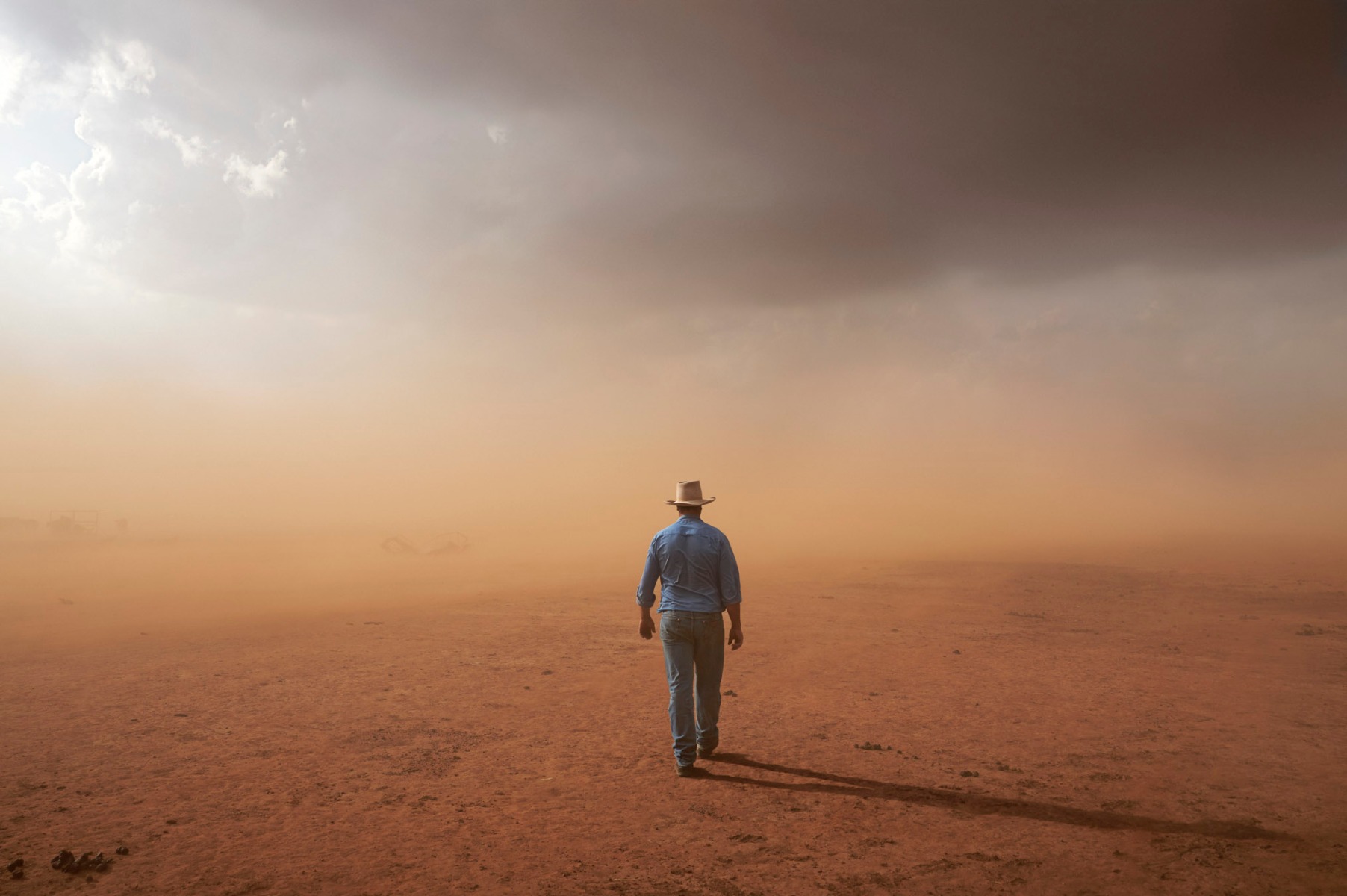 a-farmer-walks-into-a-dust-storm