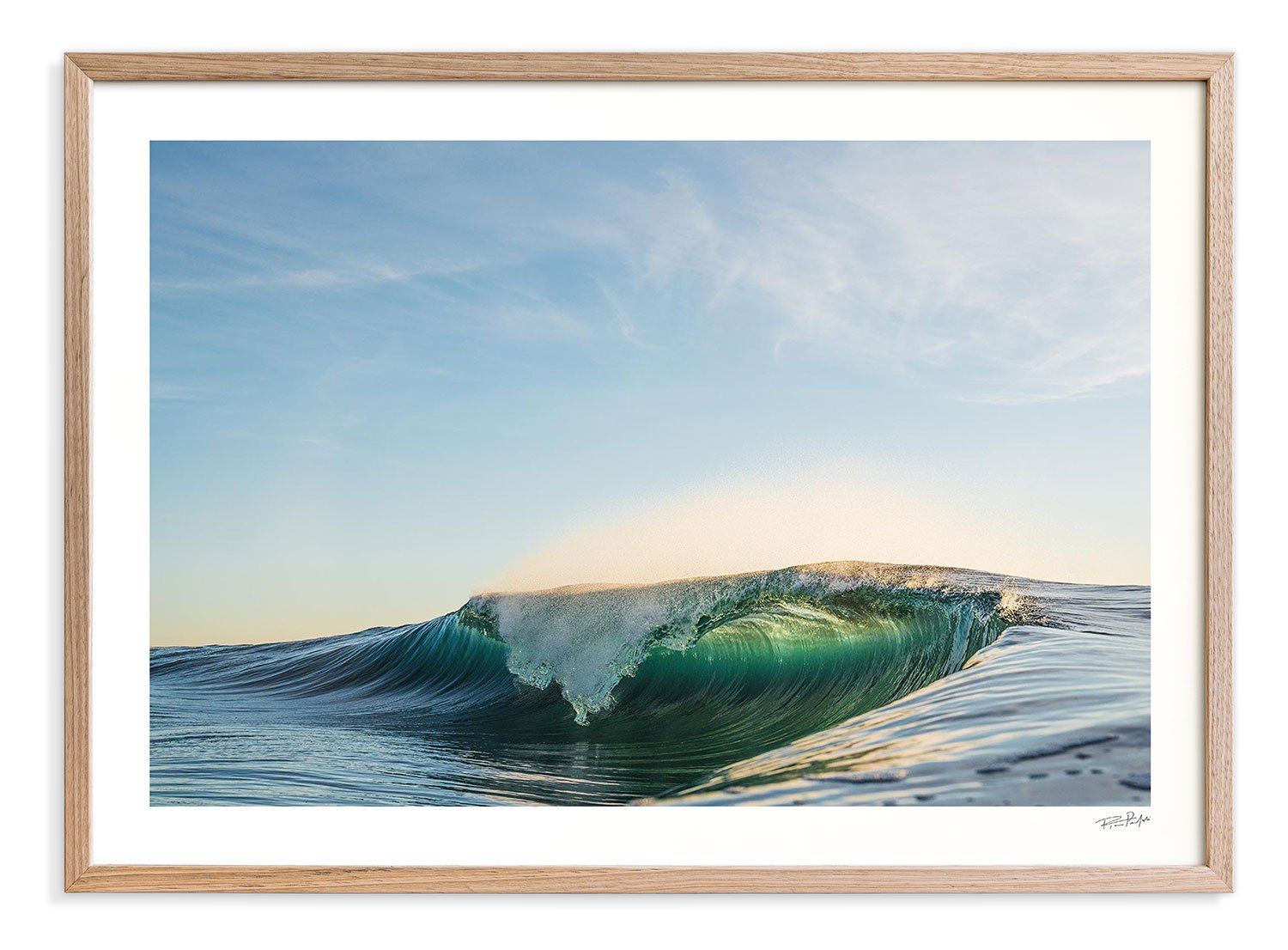 framed-photograph-of-wave-mid-break-backlit-framed-in-oak