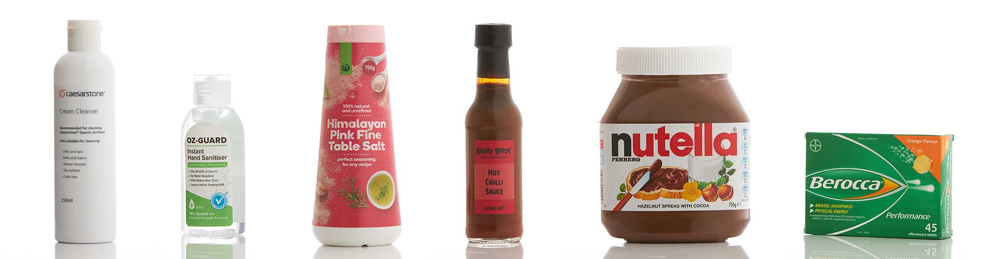 various-products-including-nutella-hand-sanitiser bottles-photographed-on-a-clean-white-background