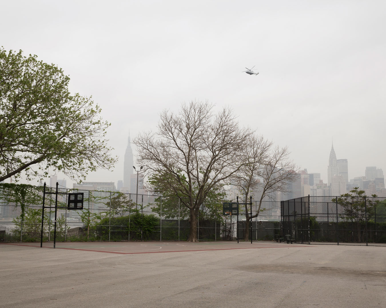 new-york-urban-basketball-coart-with-helicopter-overhead