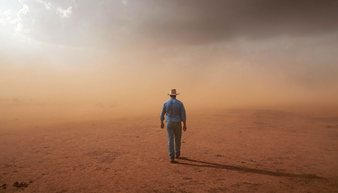 a-farmer-walks-into-a-dust-storm-lacking-a-horizon