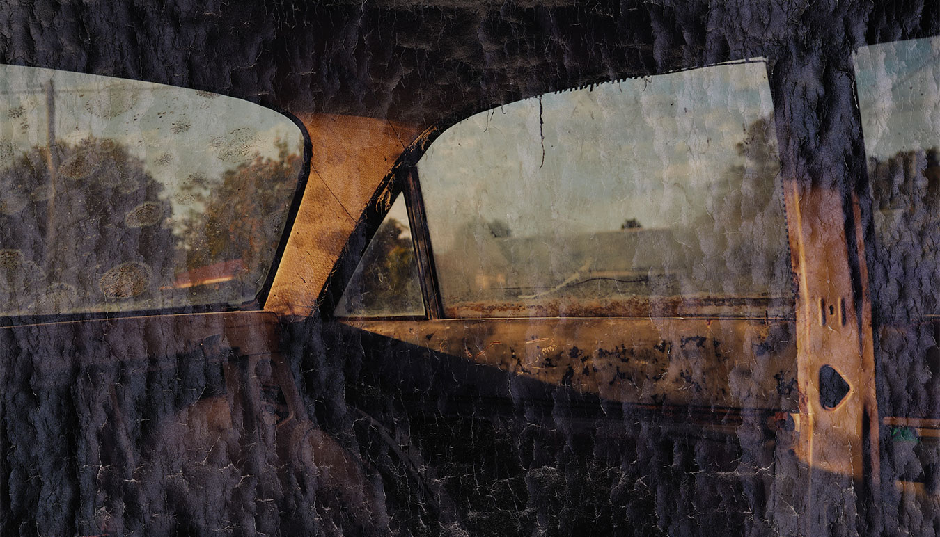 warm-toned-photograph-of-a-car-interior-delicately-crumpled-surface