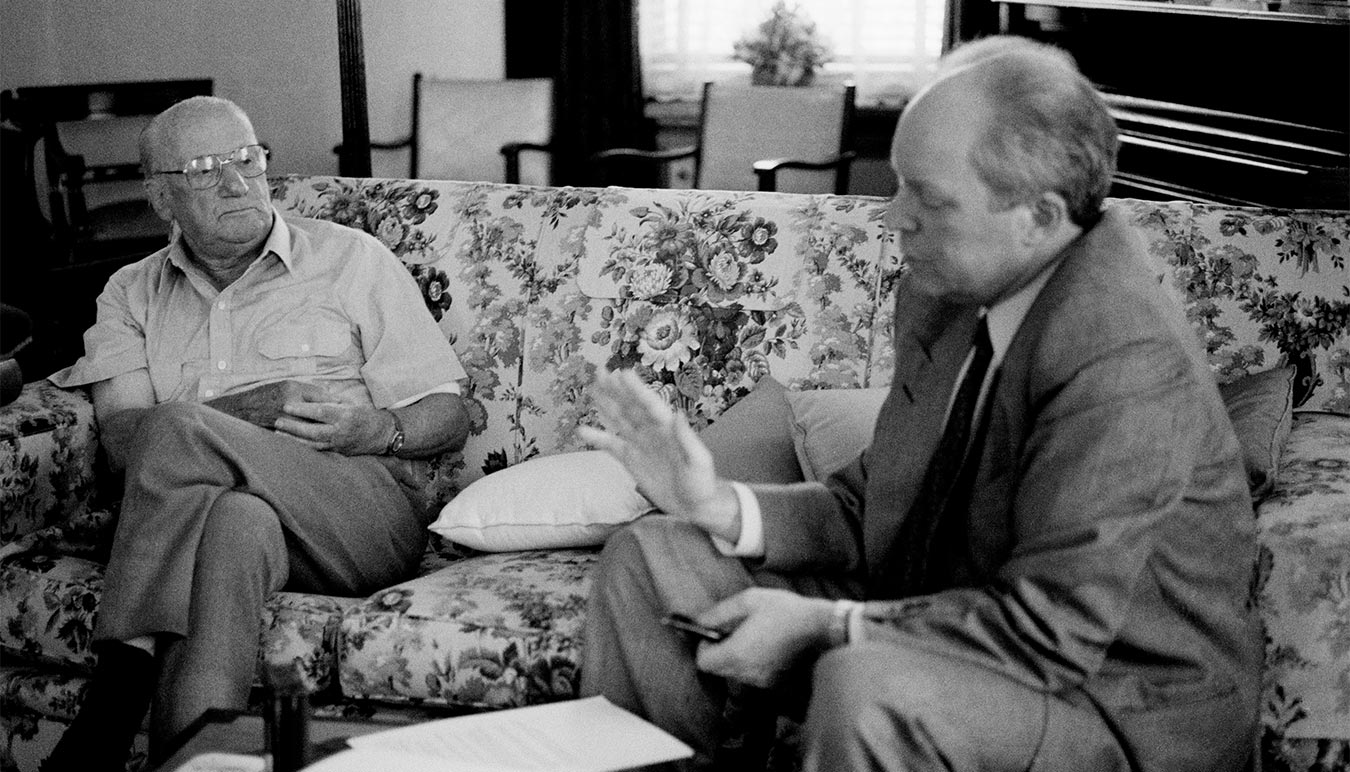 Author Roland Perry interviews Australian cricketer Sir Donald Bradman in 1995. Image by Dean Golja. 